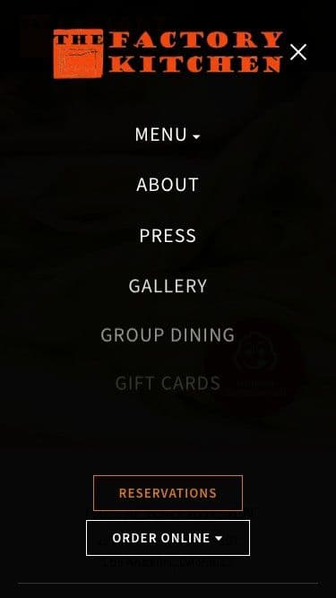 The Factory Kitchen website shown on a mobile phone